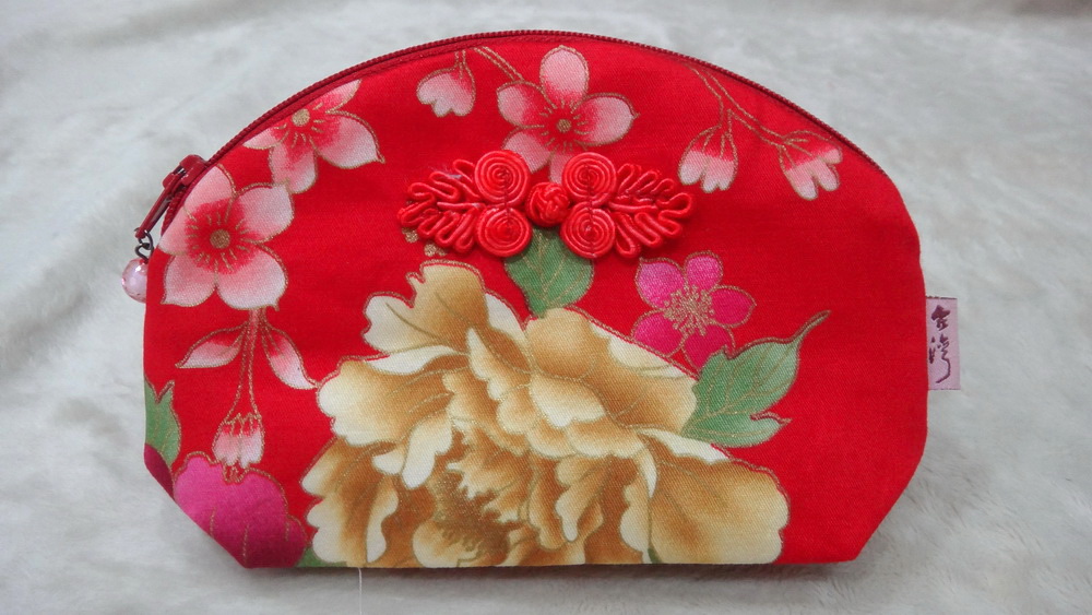   花布貝殼包  