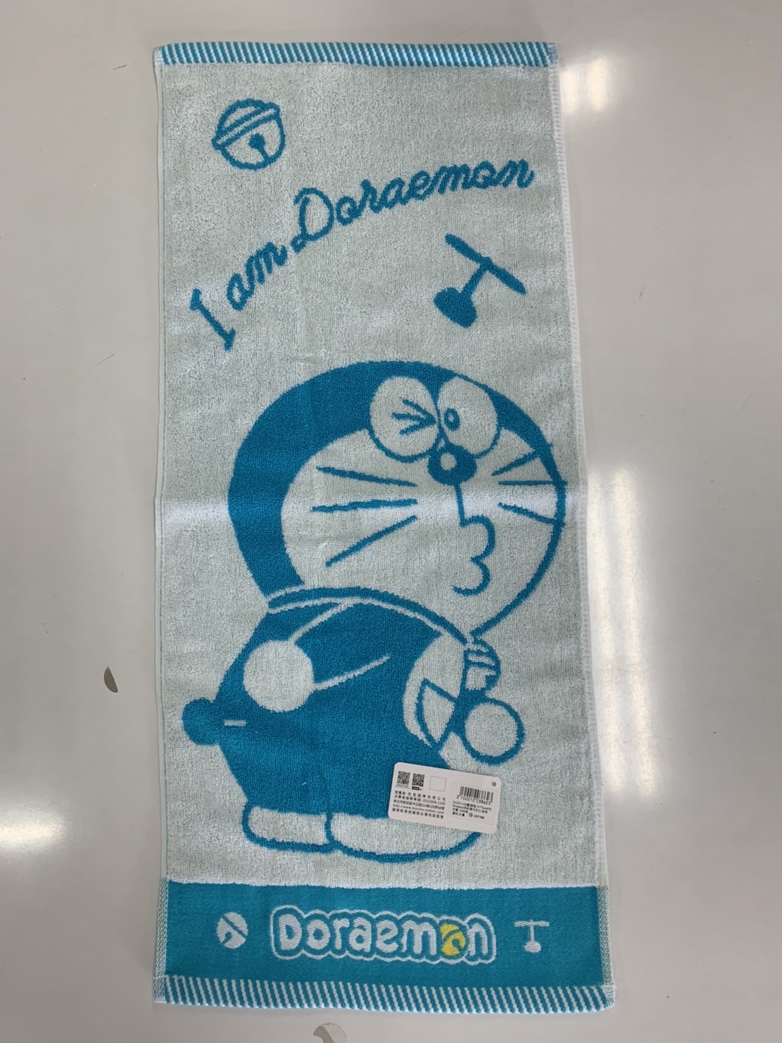 DA303-1Doraemon 色紗緹花毛巾-啾咪