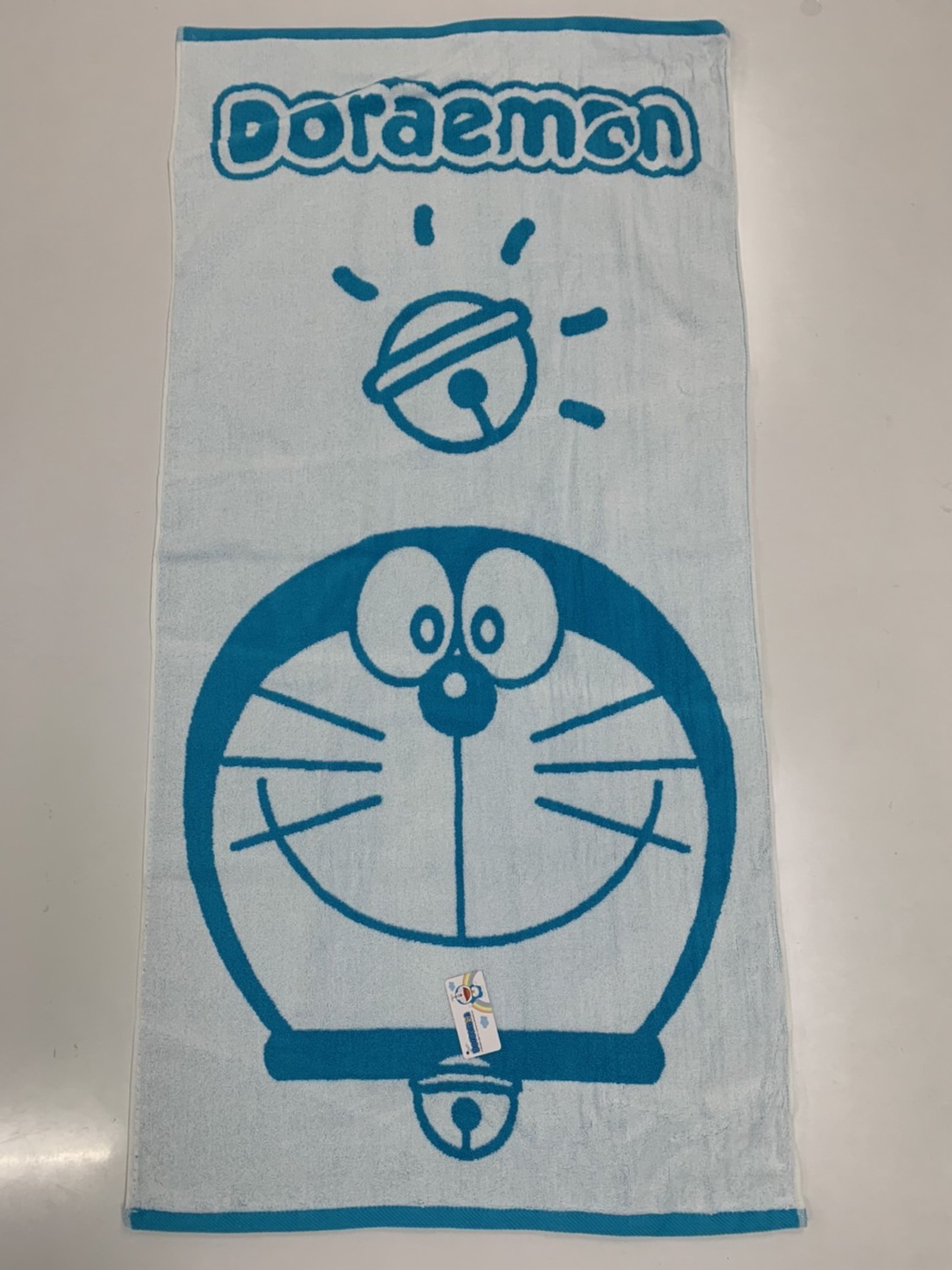 DA404-1Doraemon 色紗緹花浴巾-好心情