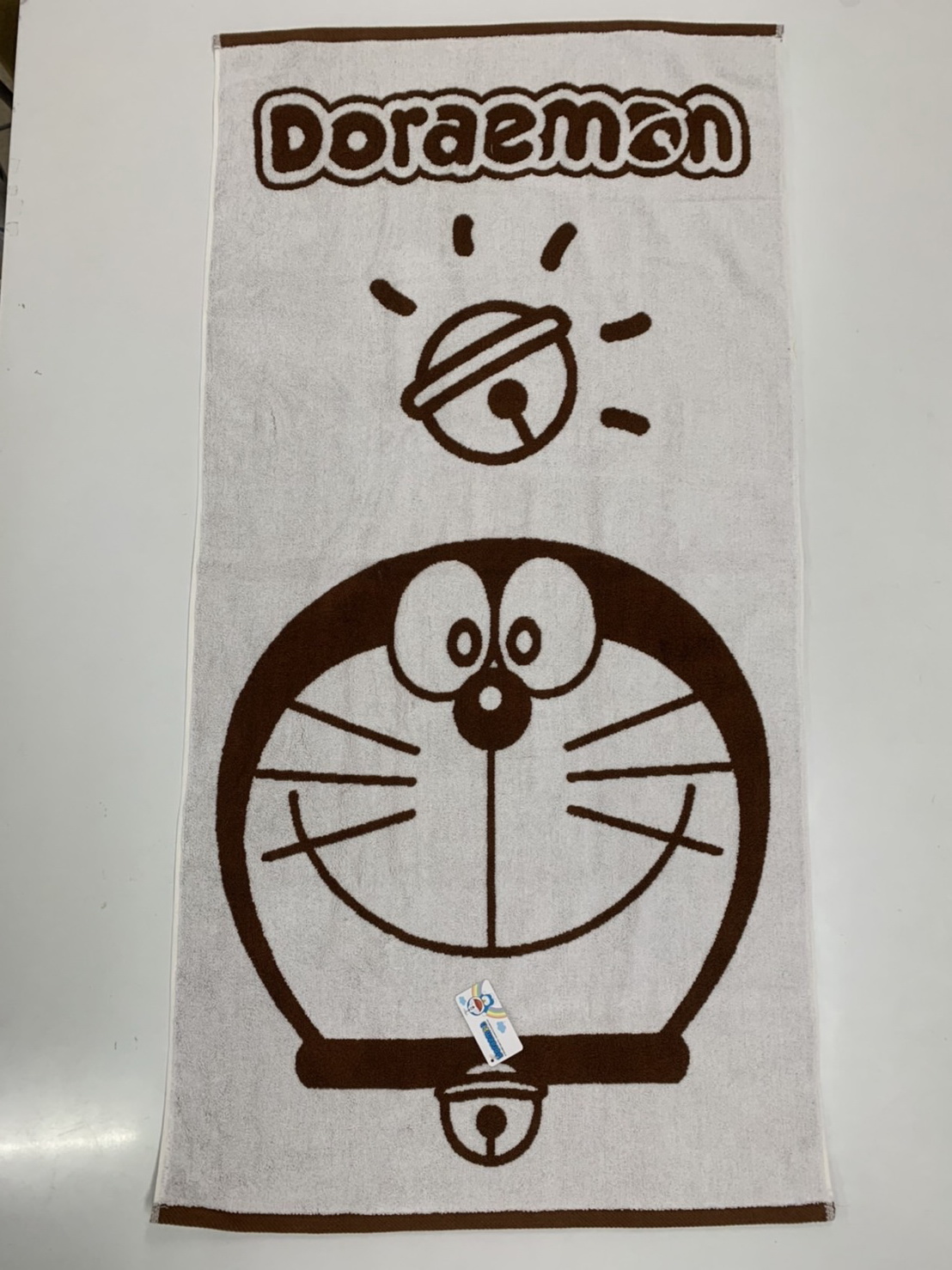 DA404-2Doraemon 色紗緹花浴巾-好心情